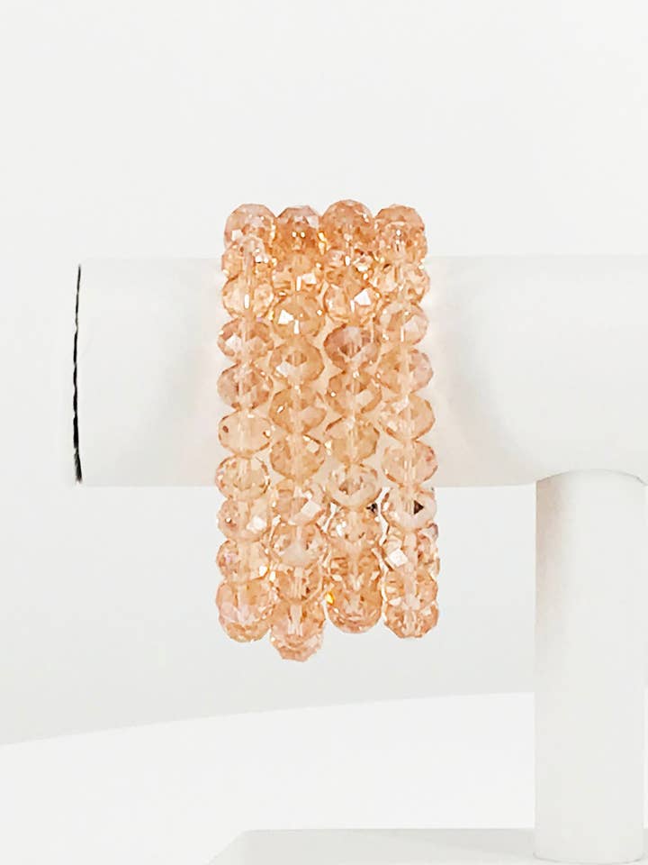 Persika glas pärla stretchigt armband för wholesale av Magnolia & Peach Jewelry Boutique, LLC