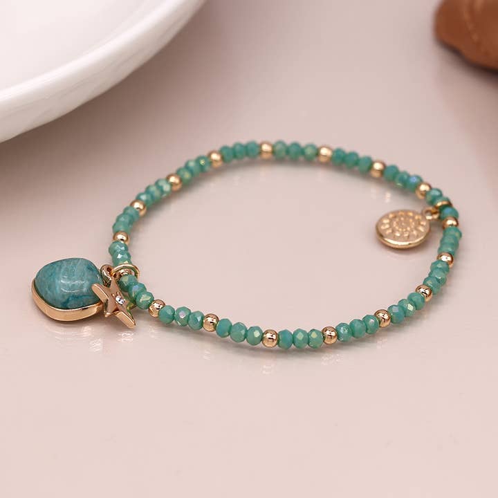 Sea Green And Golden Charm Bracelet With Star And Stone for wholesale by Peace Of Mind