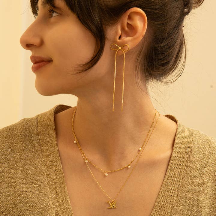 Amano Studio - Venta al por mayor Collares con colgantes/abalorios - Collar con pequeño colgante de golondrina1