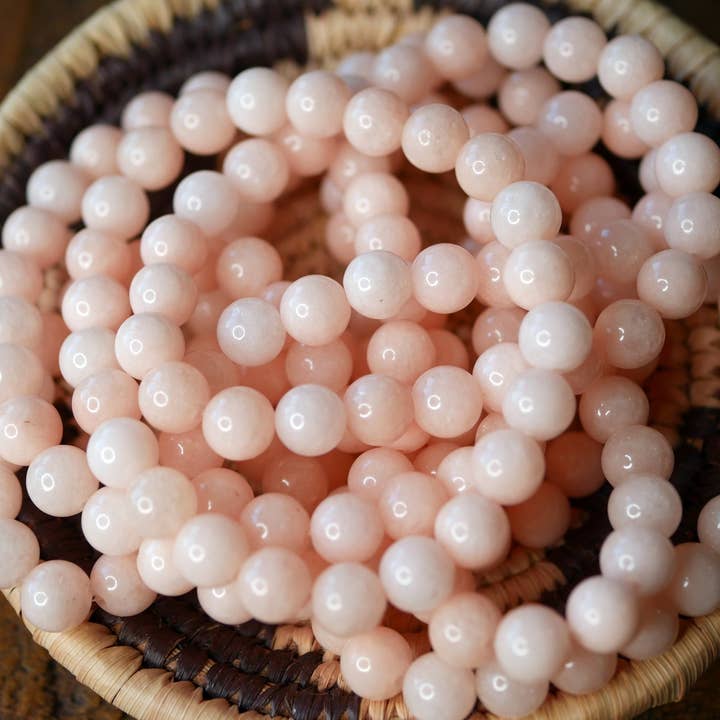 Gemstone Stretch Bracelet Pale Pink Jade Enhanced for wholesale by Superior Stones & Gifts INTL LLP