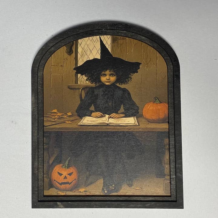 Witch behind desk at Academy in Small Arch Frame for wholesale by LAND OF COTTON