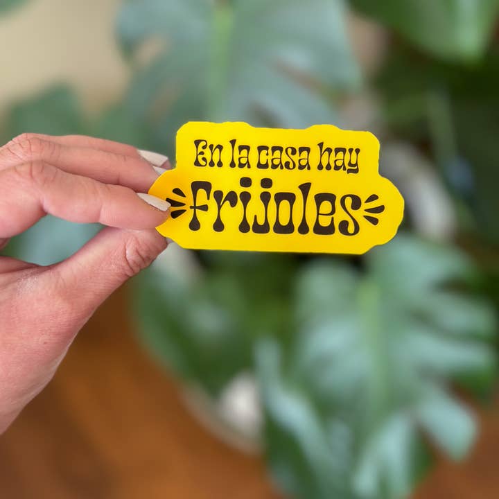 En La Casa Hay Frijoles Spanish Sticker for wholesale by Saguaro Creative Co.