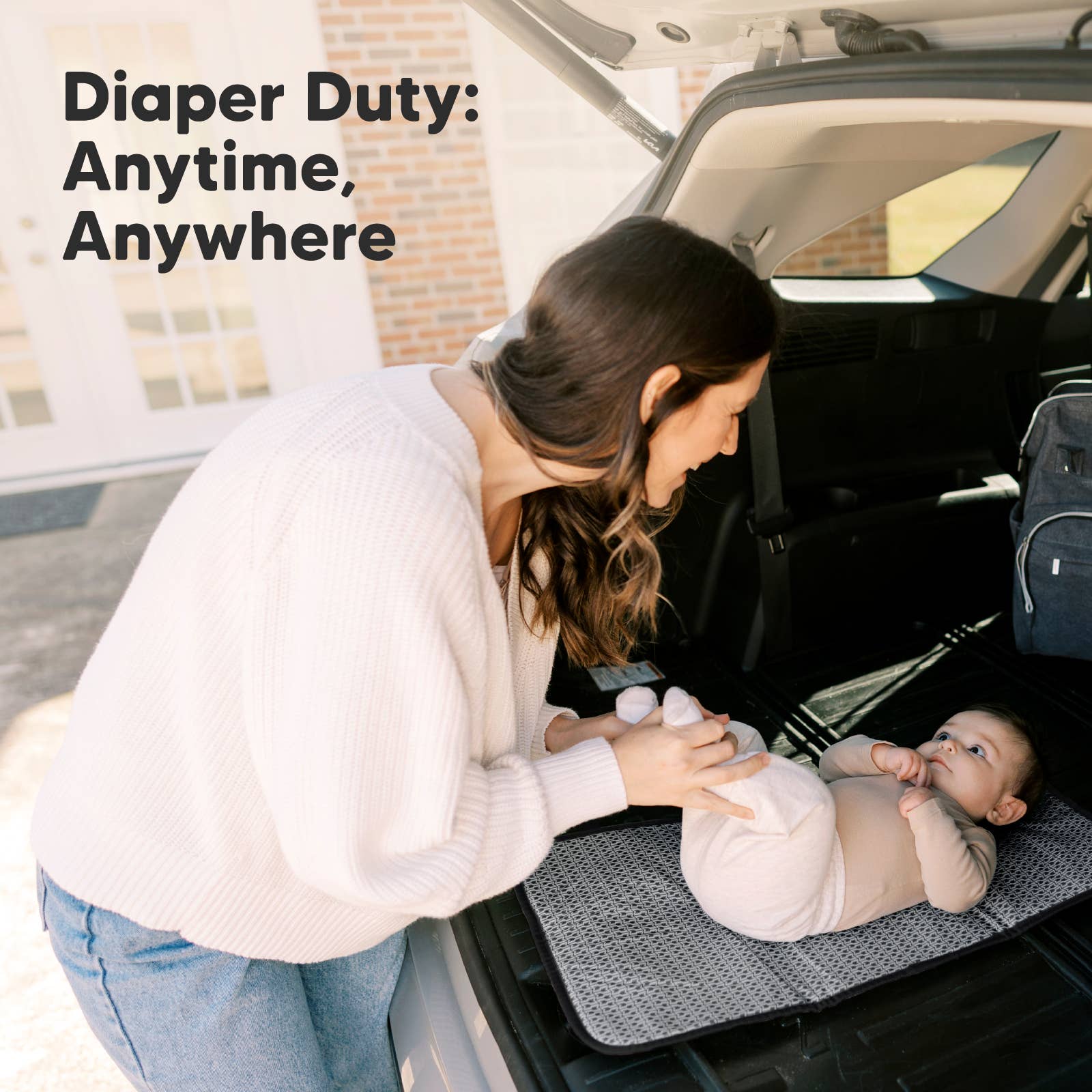 Sort Geo Swift bærbar puslepude til baby, ble skiftemåtte for engroshandel på Faire7