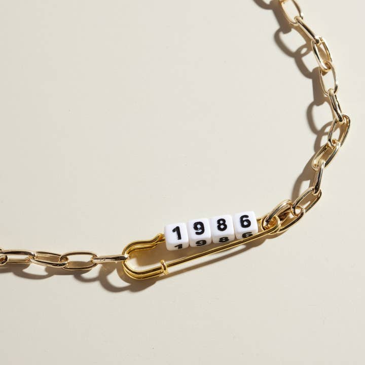 Custom Safety Pin Necklace for wholesale by Nickel and Suede