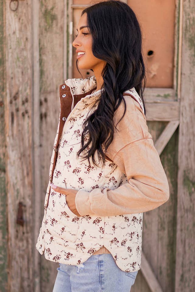 As shown Fashion-W Floral Print Zip Up Quilted Vest for wholesale on Faire4