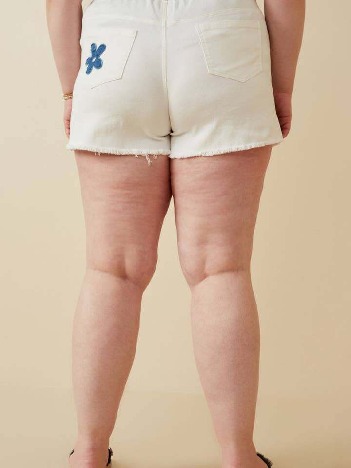 Womens Denim Floral Patch Denim Shorts for wholesale on Faire7