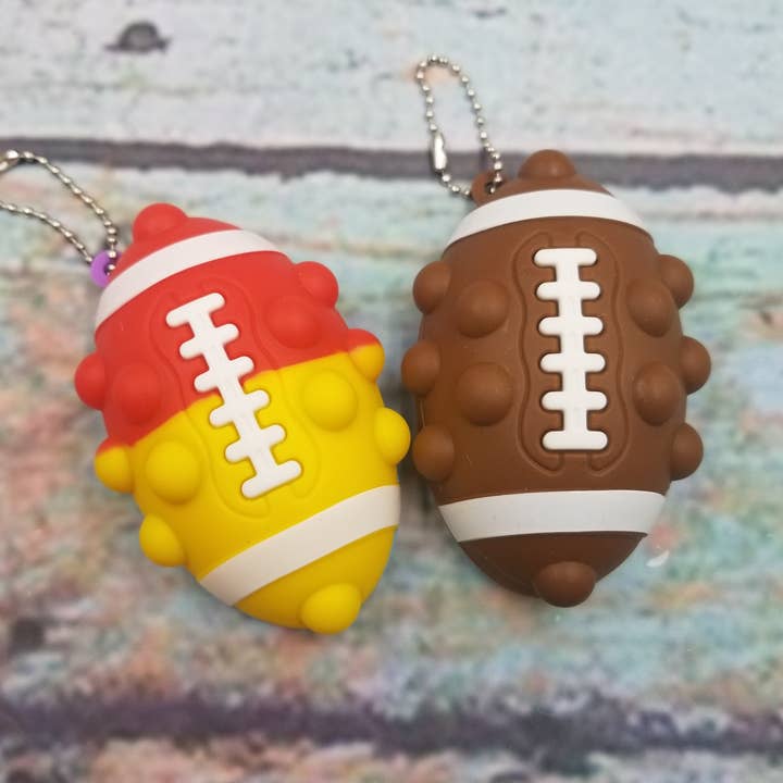 Jouets à doigts Rugby Squid Pop pour la vente par MIAS SHOP