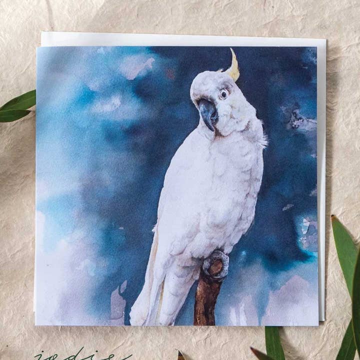 'Stormy Night' svavel-crested kakadua - gratulationskort för wholesale av Jodie Westall Art