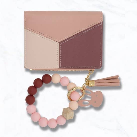 Faux Leather Bunny Cut Out Keychain Wallet and other Purchase Wholesale bunny keychain. Free Returns & Net 60 Terms on Faire trending on Faire.