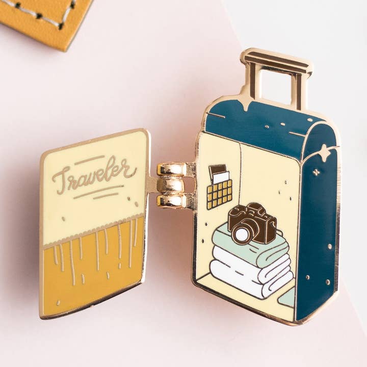 Traveler Suitcase Interactive Enamel Pin for wholesale by Occasionalish