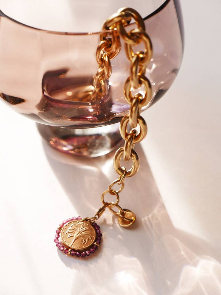 Charm Belamar Sunset -dangle golden medal with purple stones for wholesale by Palas
