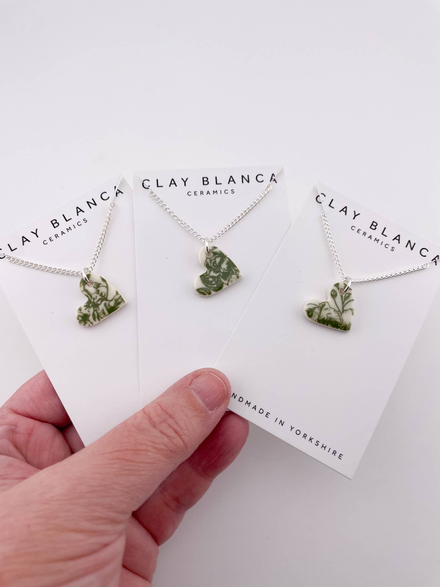 Clay Blanca - Wholesale Pendant/Charm Necklace - Green China Small Heart (side) Pendant necklace (Options)1