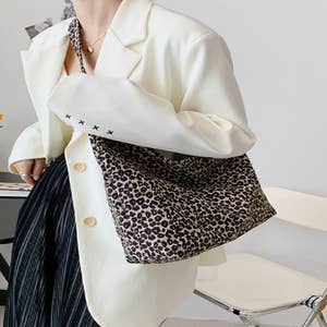 Purchase Wholesale leopard handbag. Free Returns & Net 60 Terms on Faire