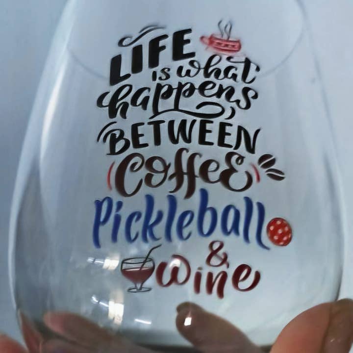 Pickleball wine or cocktail glass, Life is what happens ... for wholesale by Cork Pops Inc