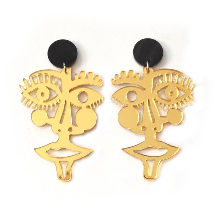Lasercut Face Statement oorbellen in goud acryl voor wholesale door Boo and Boo Factory