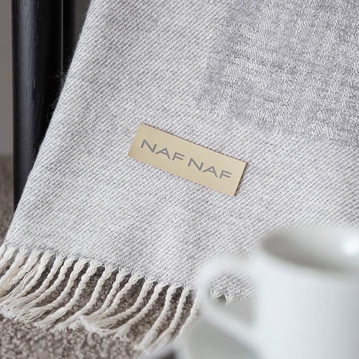 Grey BRAILLE plaid blanket for wholesale on Faire