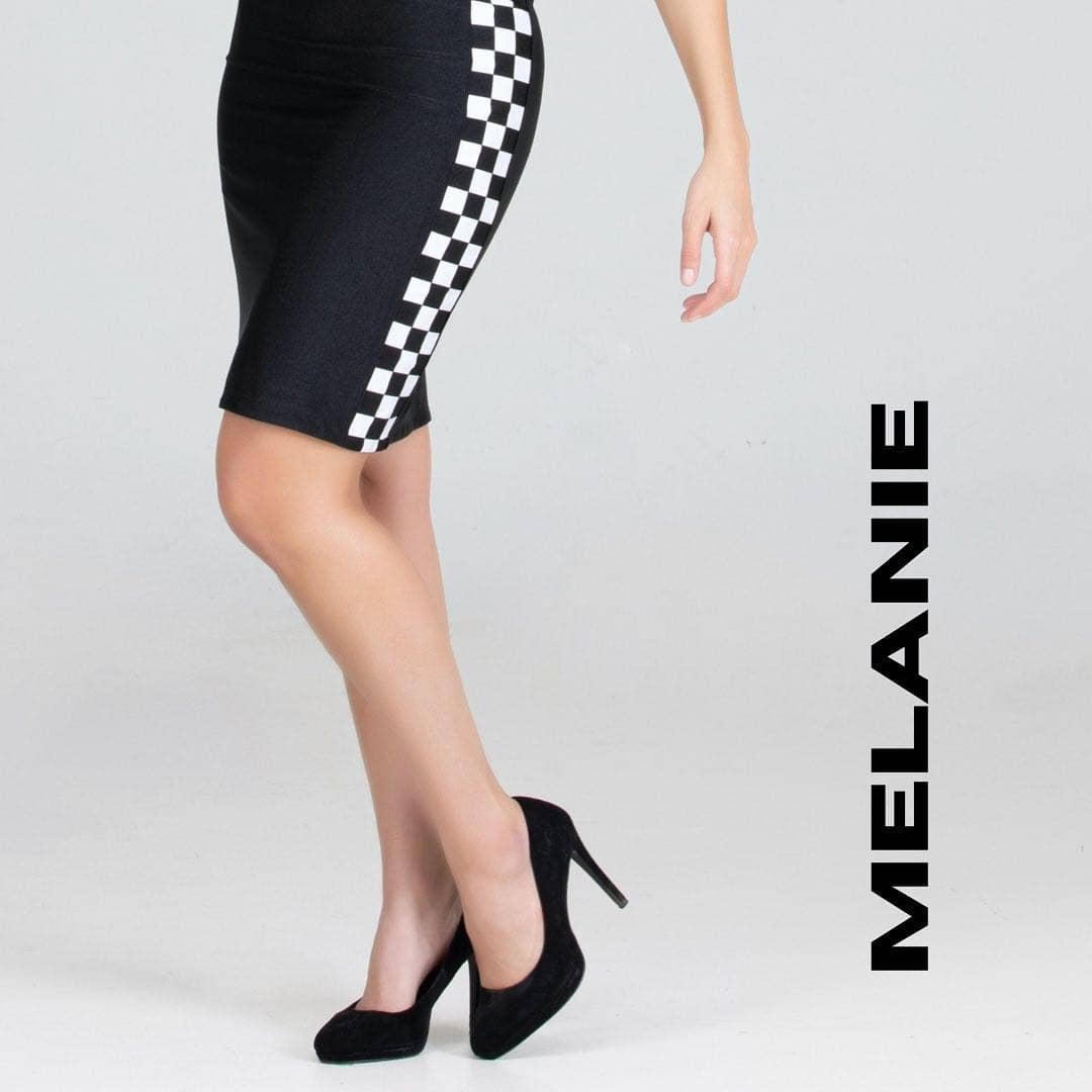 Fever1 Fashion – Engroshandel Nederdel - Dame – Vendbar sort/hvid kort nederdel med ternede sider2