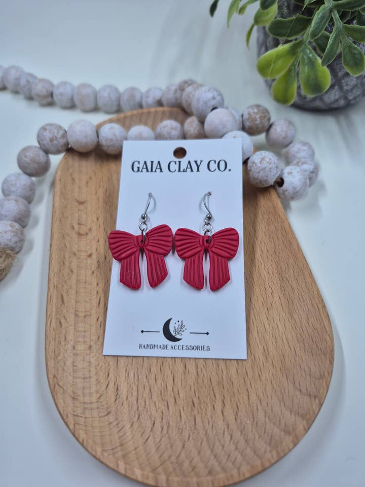 Red Embossed bows for wholesale by Gaiaclayco