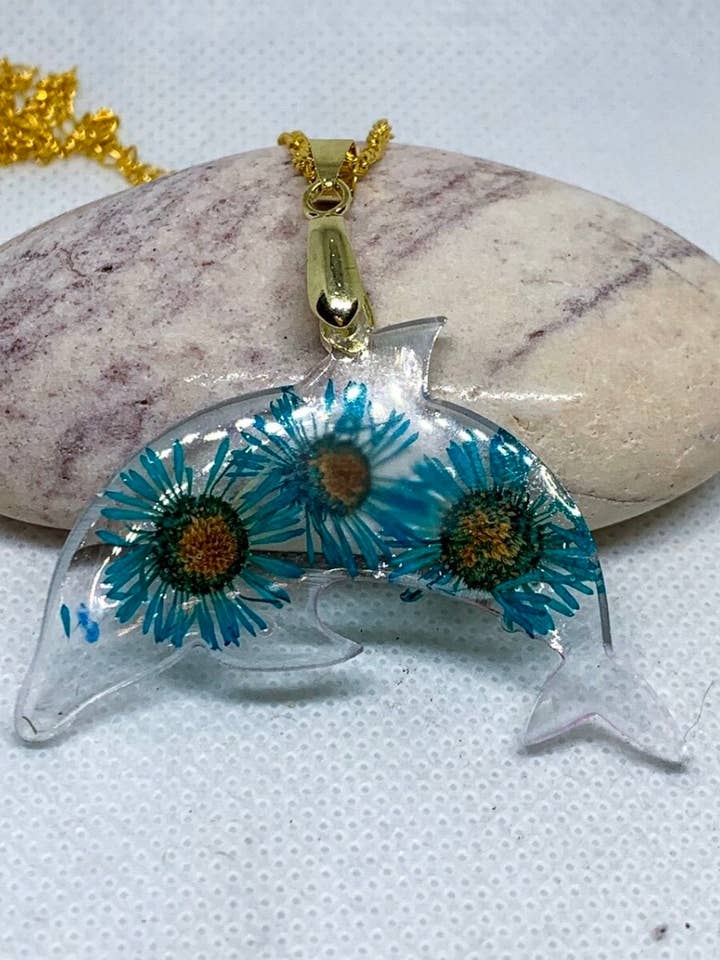 Dolphin necklace with real flowers for wholesale by Vivian Treasury