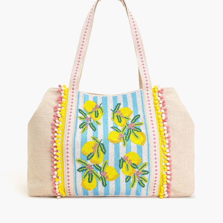 Limoncello Stripe Tote and other Purchase Wholesale blue pom poms. Free Returns & Net 60 Terms on Faire trending on Faire.