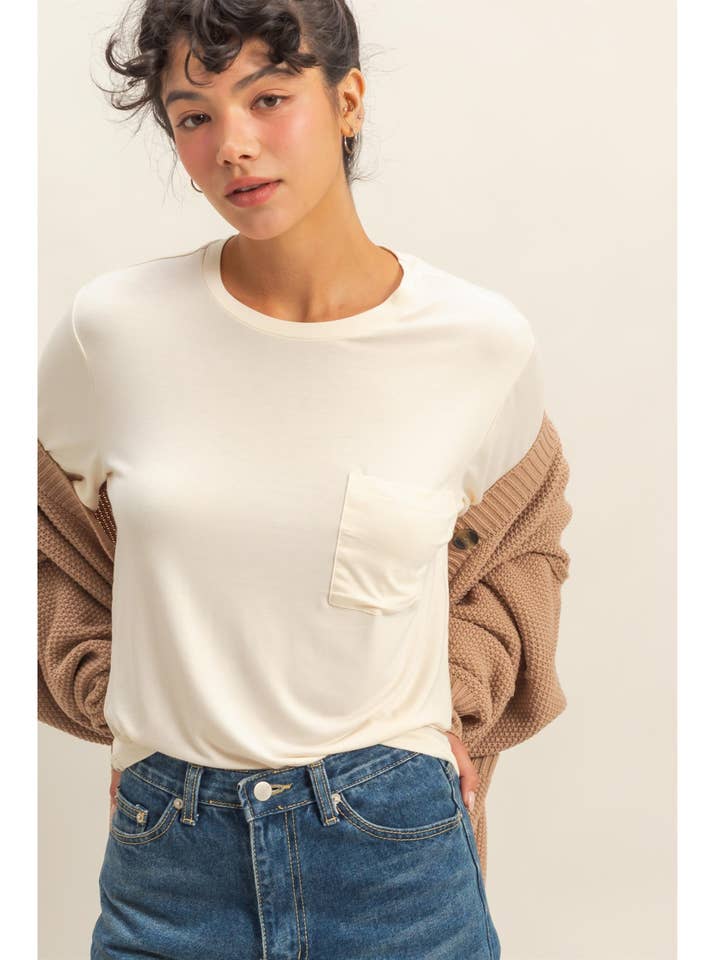 Classic Crew Neck Short Sleeve Pocket Top and other Purchase Wholesale pocket tee. Free Returns & Net 60 Terms on Faire trending on Faire.