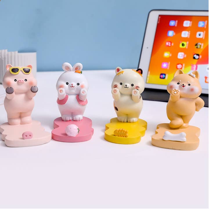 CUTE ANIMAL RESIN PHONE STAND HOLDER and other Purchase Wholesale phone fan. Free Returns & Net 60 Terms on Faire trending on Faire.