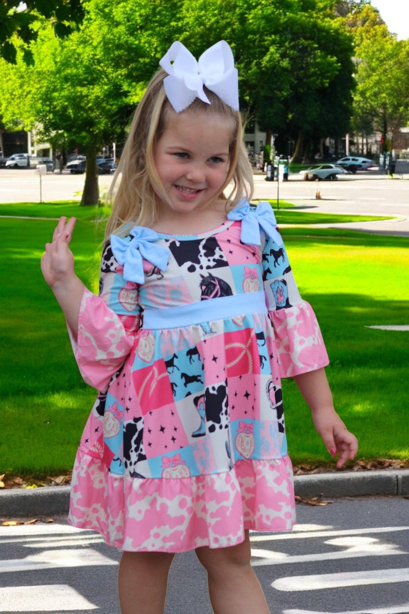 Kids Charm Online - Wholesale Dress - Kids - Beautiful wester patch printed girls dress with bows and cow printed hem.5