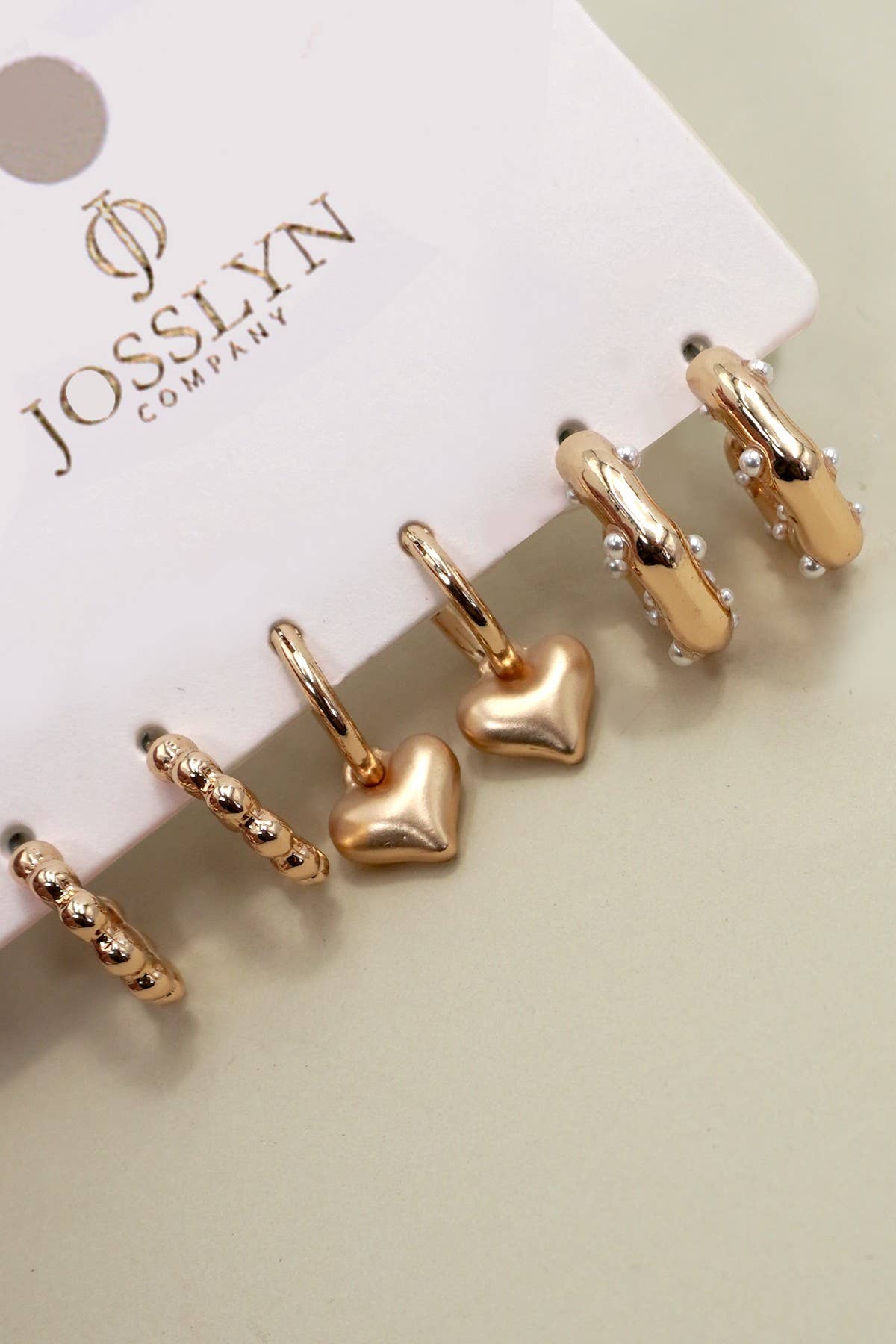 Gold HEART DROP PEARL STUDED HOOP TRIO EARRINGS | 80E6397 for wholesale on Faire