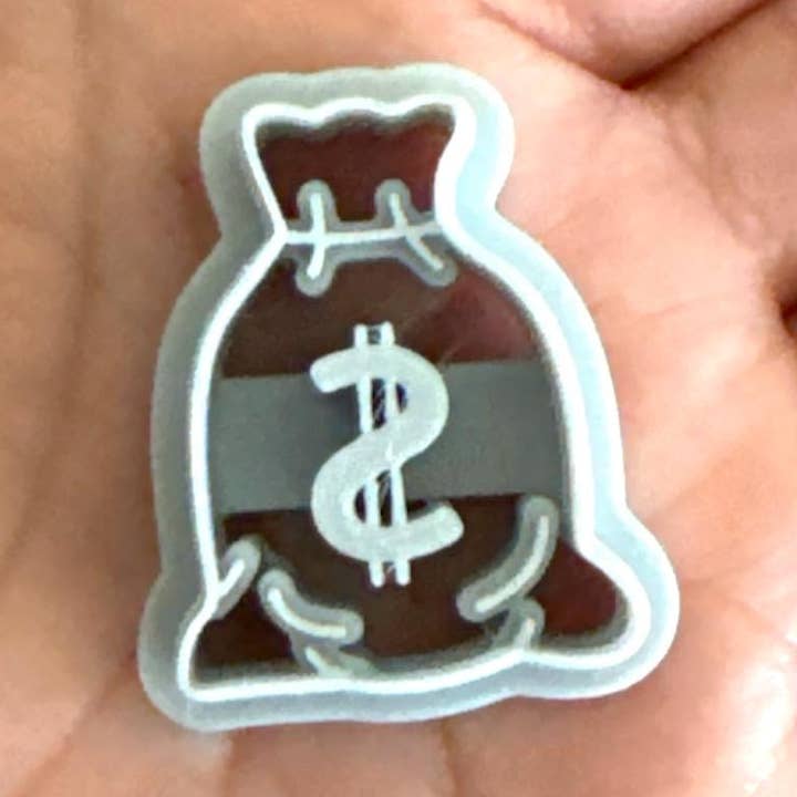 Dollarsäck Polymer Lerskärare för wholesale av Roussell Prints and Demand LLC