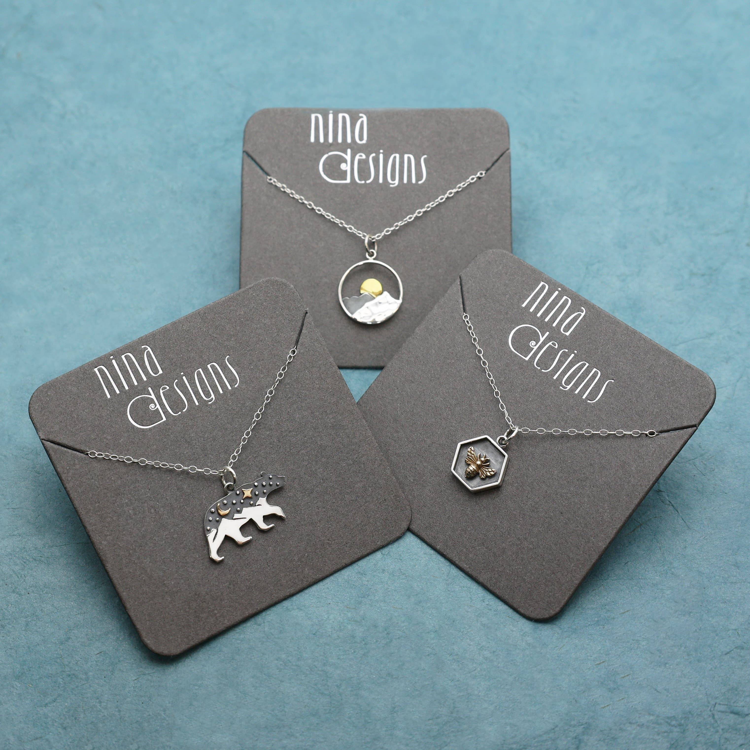 Nina Designs - Wholesale Pendant/Charm Necklace - Sterling Silver Mountain Necklace with Bronze Sun6