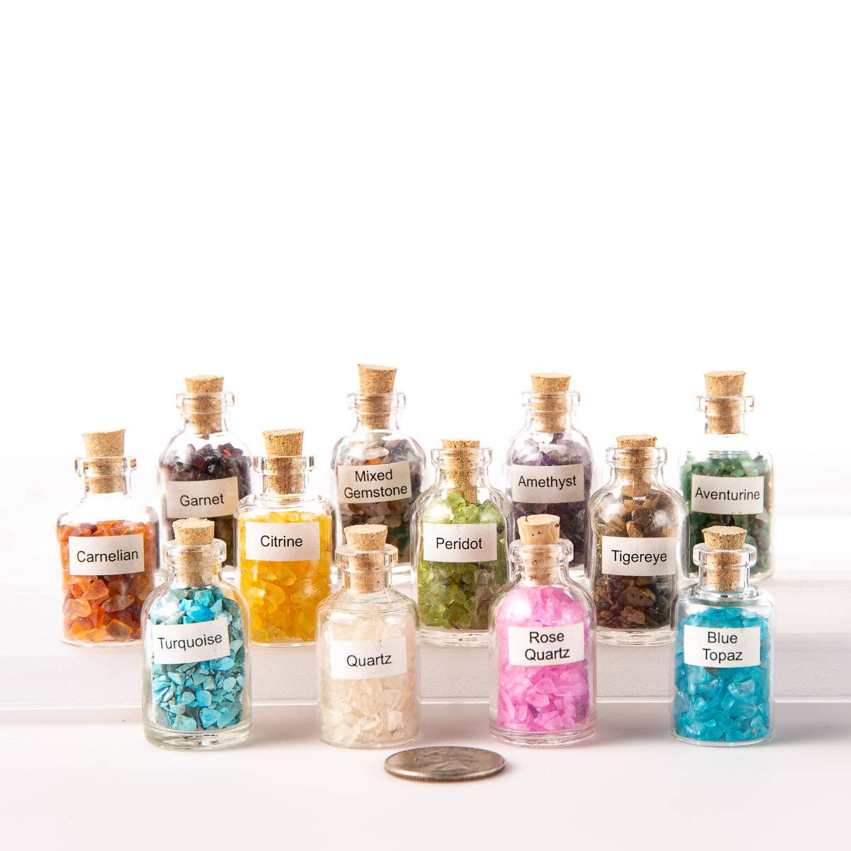 Tree of Life Gems – wholesale Spiritual stone/crystal – 9 Tumbled Chip Crystal Gemstone Mini Bottles1