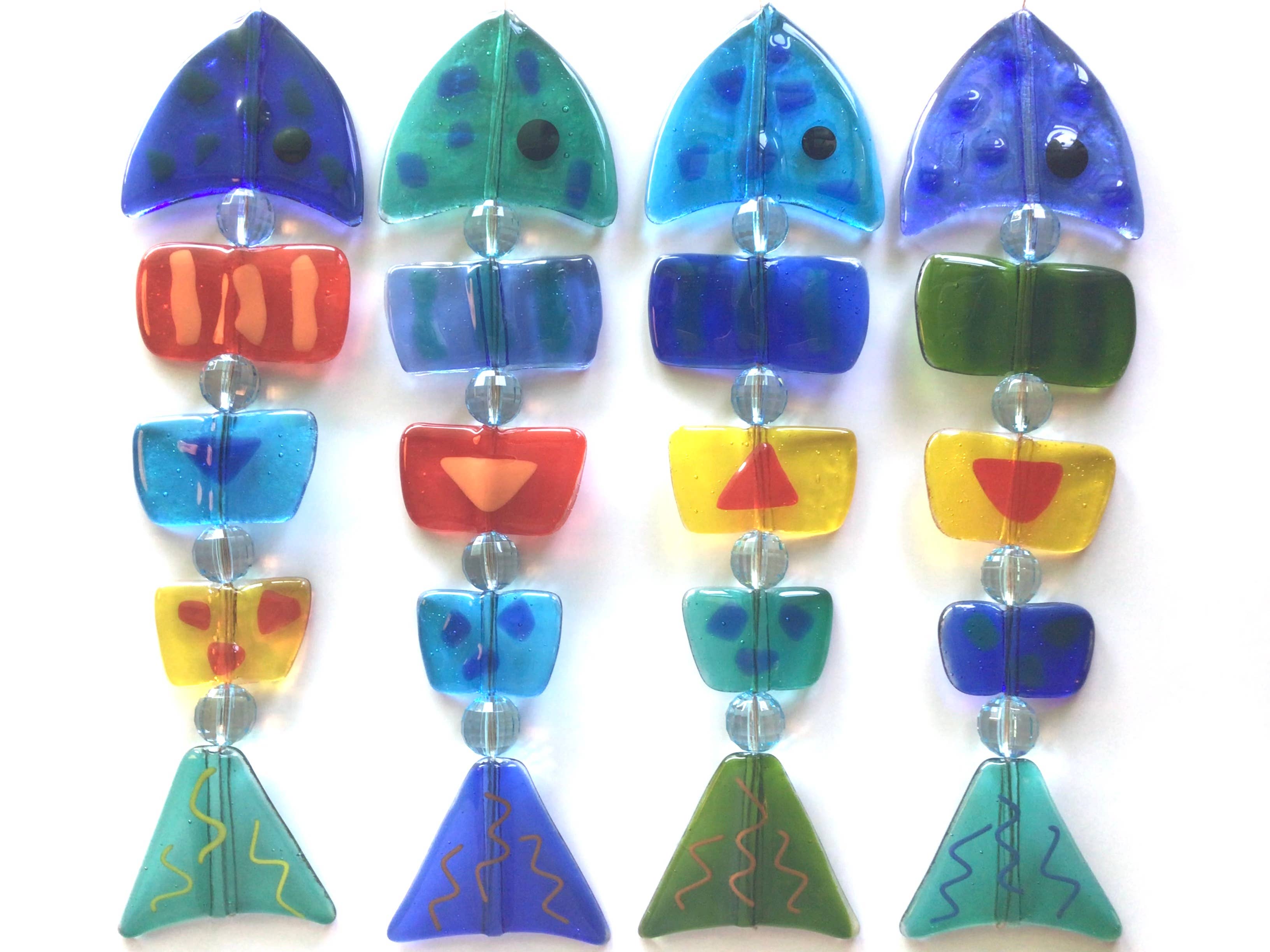 Diverse kleuren Damevis glazen vis mobiel, zonnevanger voor groothandel op Faire4