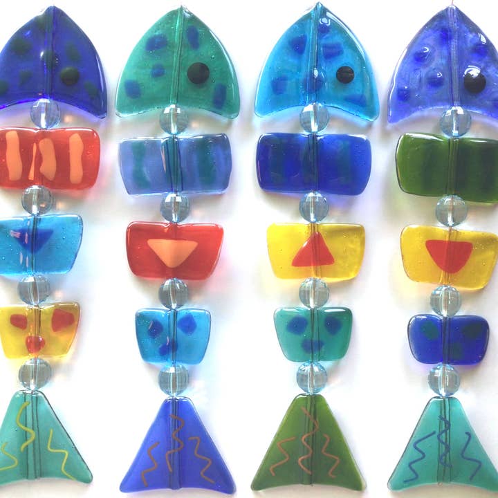 Diverse kleuren Damevis glazen vis mobiel, zonnevanger voor groothandel op Faire4