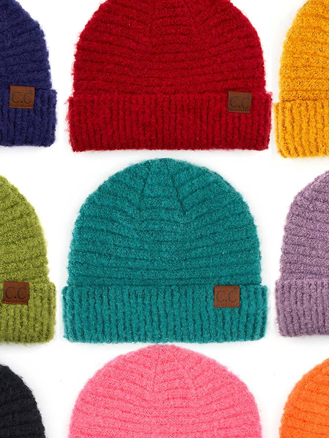 Cappello invernale C.C Solid Boucle in filato bouclé con risvolto per la vendita all'ingrosso da parte di Hana