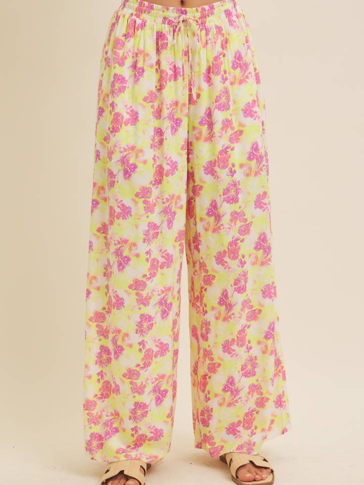 PANTALON LARGE À IMPRIMÉ FLORAL AVEC POCHES ET CORDONS DE SERRAGE pour la vente par in february