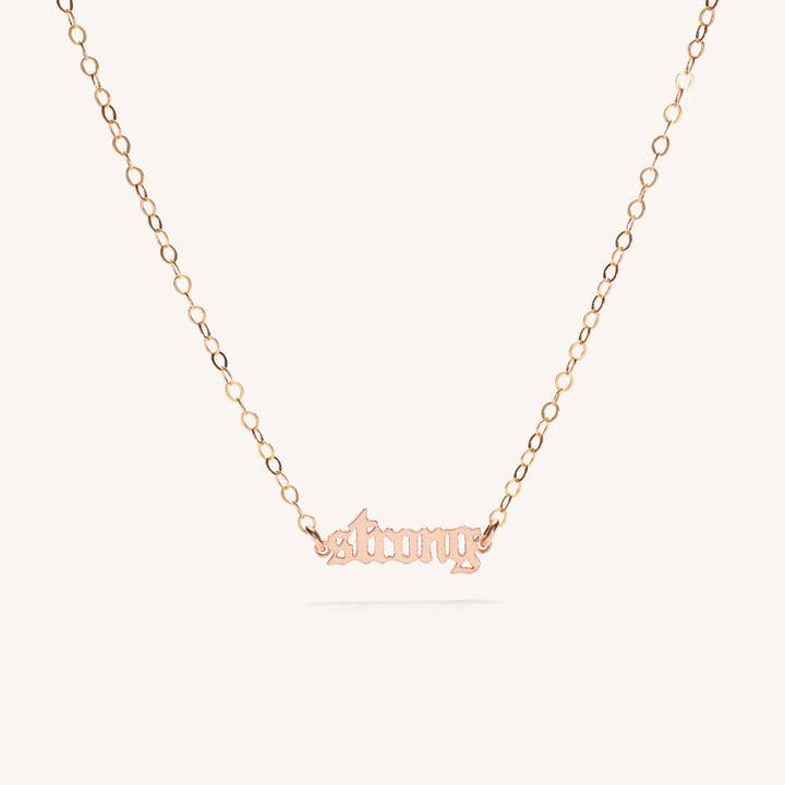 MINI COLLANA CON AFFERMAZIONE 'STRONG' per la vendita all'ingrosso da parte di Beads by Tara