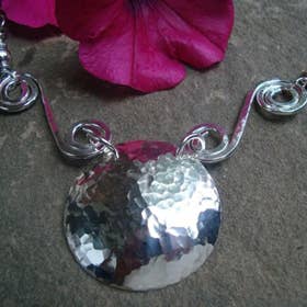Circle and Swirls Hammered Sterling Silver Necklace for wholesale by Simply Sterling Designs