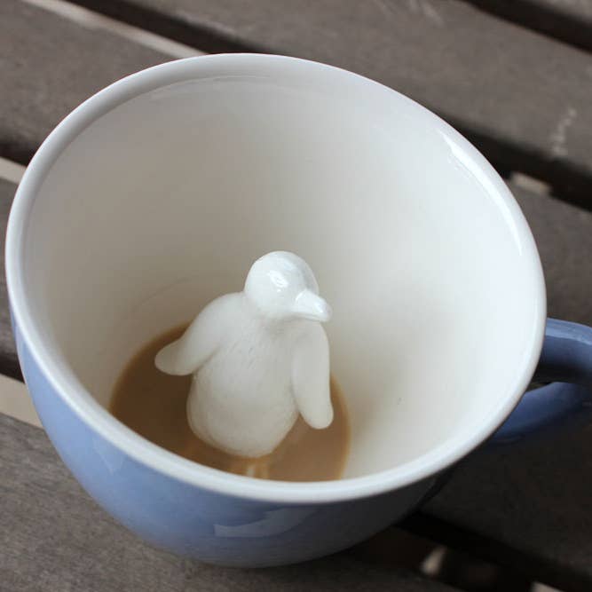 Ceramic PENGUIN Surprise Animal Mug (11 oz. - Ice Blue) for wholesale by Creature Cups