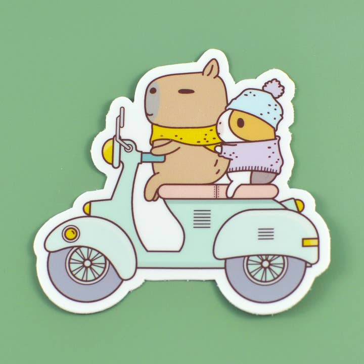 Bubu and Moonch Riding Scooter Vinyl Sticker for wholesale by Noristudio