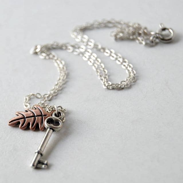 18" Secret Garden Necklace | Skeleton Key & Leaf Charm for wholesale by Enchanted Leaves