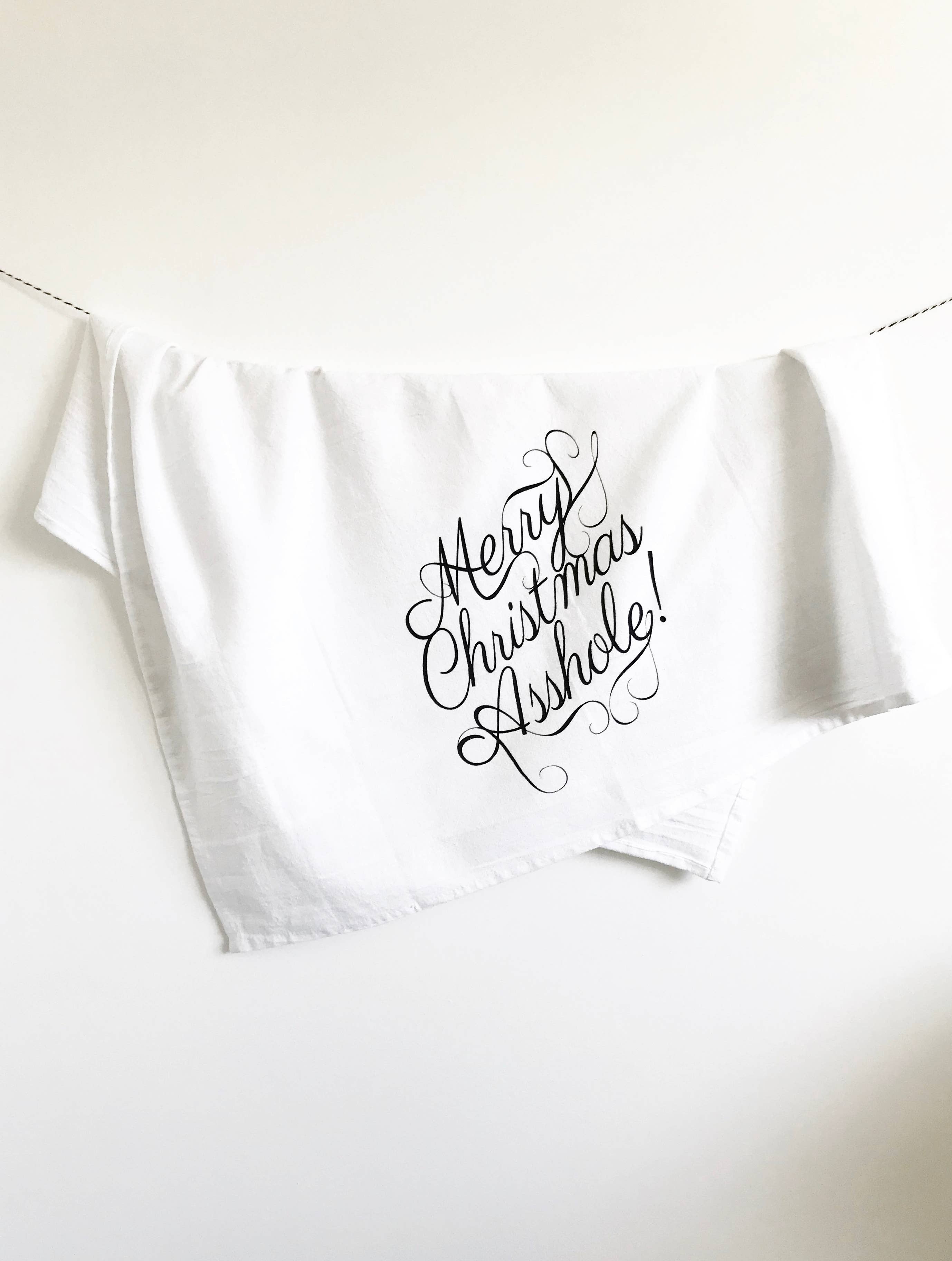 The Coin Laundry - Wholesale Tea Towel - Merry Christmas Asshole Funny Holiday Kitchen Towel1