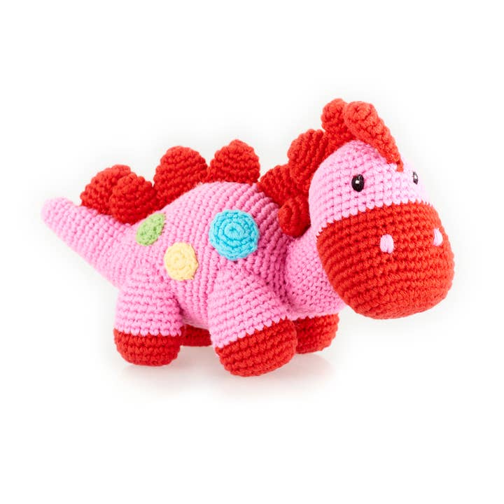Handmade Stegosaurus Baby Rattle | Organic Cotton | Pink for wholesale by Pebble