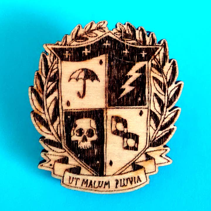Umbrella Academy Crest - Lasercut Pin for wholesale by Studio Smalls