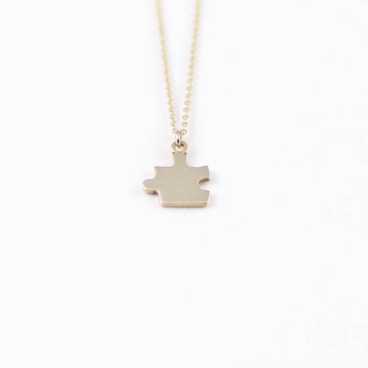 Puzzle Piece Cut Out Necklace- 24k Gold Plated for wholesale by Lovishly