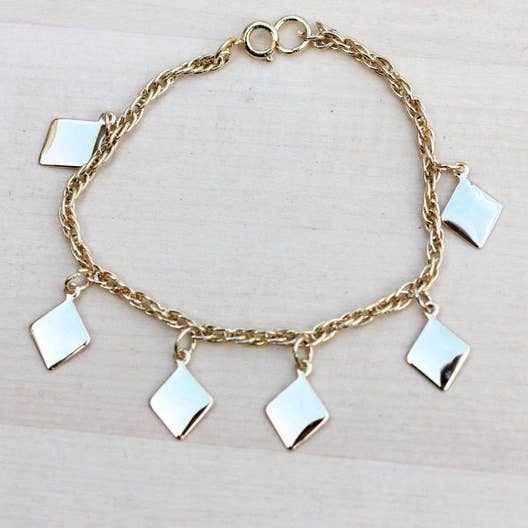 Gold Diamond Charm Bracelet for wholesale by Diament Jewelry