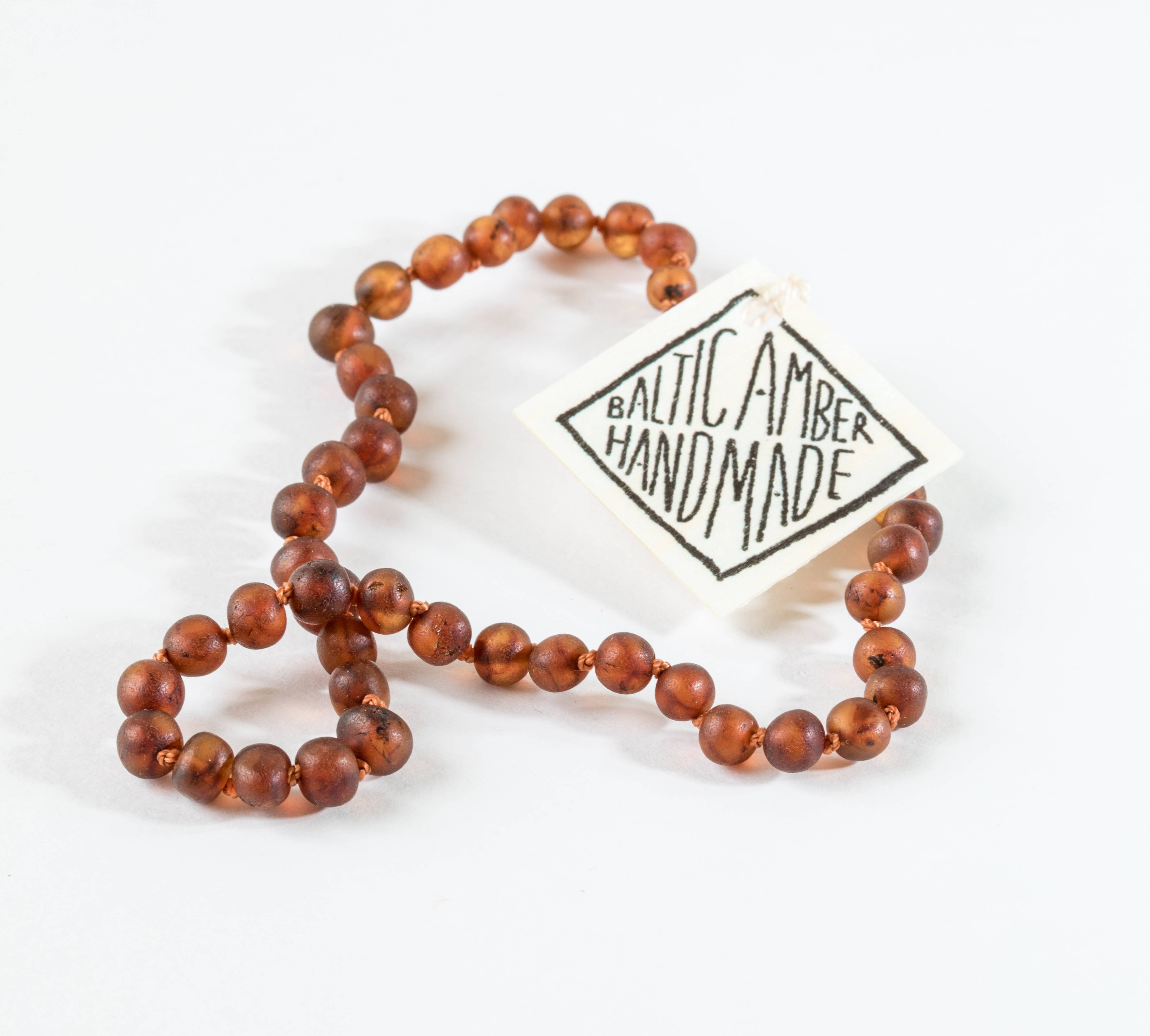 CanyonLeaf - Vente Collier de perles - Adulte : ambre de la mer Baltique au cognac brut | Collier en perles brunes1