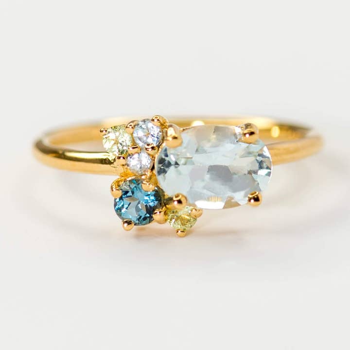 Hayden Aquamarine Cluster Band - Brass for wholesale by Minette