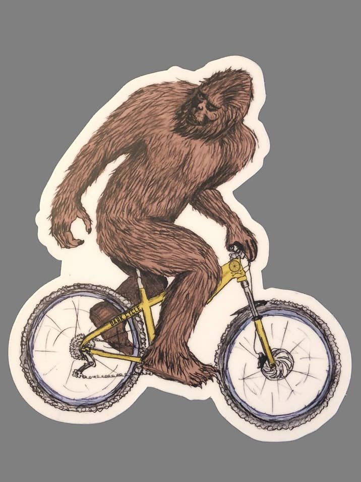 Sasquatch On A Bicycle Vinyl Sticker for wholesale by Dark Cycle Clothing