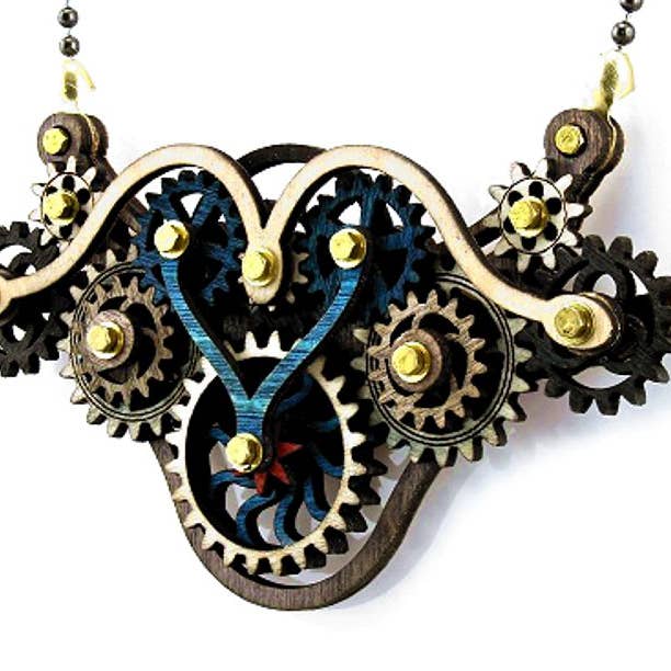 Kinetic Winged Gear Necklace 4A for wholesale by Green Tree Jewelry