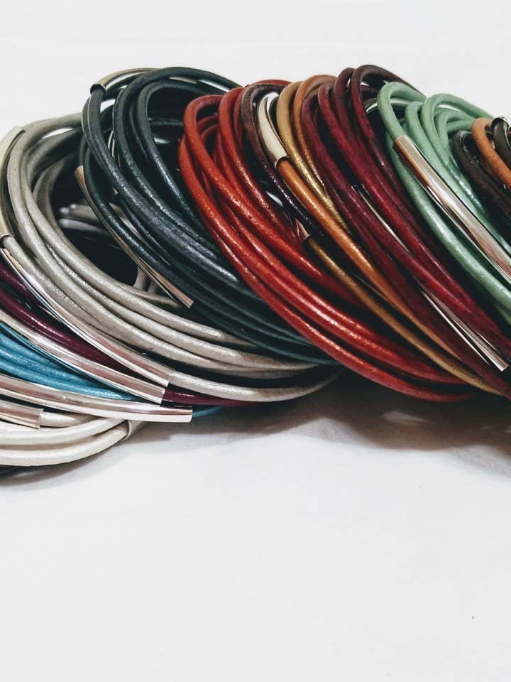 Sampler Pack of Original Wraps with Tubes (10 pack) $10 each for wholesale by City Wraps Leather